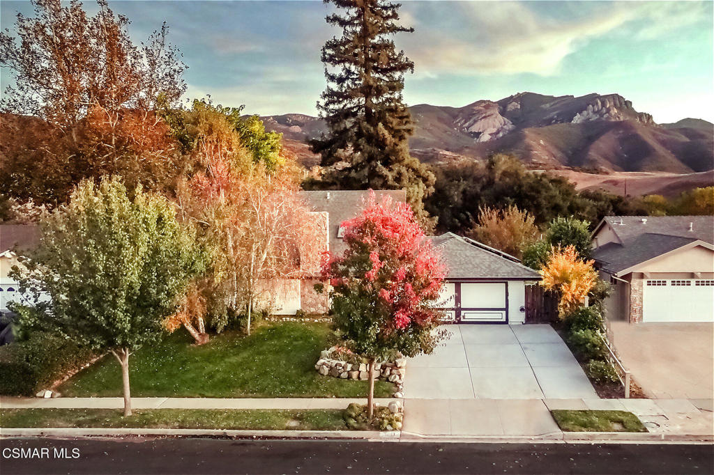 Welcome to this charming private home and highly desirable Newbury Park neighborhood nestled in the foothills of Boney Mountain. This 4 Bedroom 2 Bath plus office/den features a spacious kitchen with island and custom cabinets, finished attic space, leased solar, Boney Mountain view, an entertainers back yard with in ground spa, fruit trees and a raised garden area. RV access side yard and large driveway able to accommodate a small boat or trailer. There is no HOA. Hickory Park and miles of Santa Monica Mtn. hiking trails are all less than a mile away. Kids will love this home and the top rated Conejo Valley Schools.