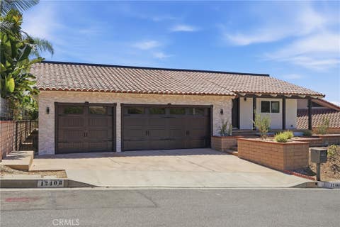 Photo of 12408 Carinthia DR, Whittier, CA 90601 (MLS # PW26141009)