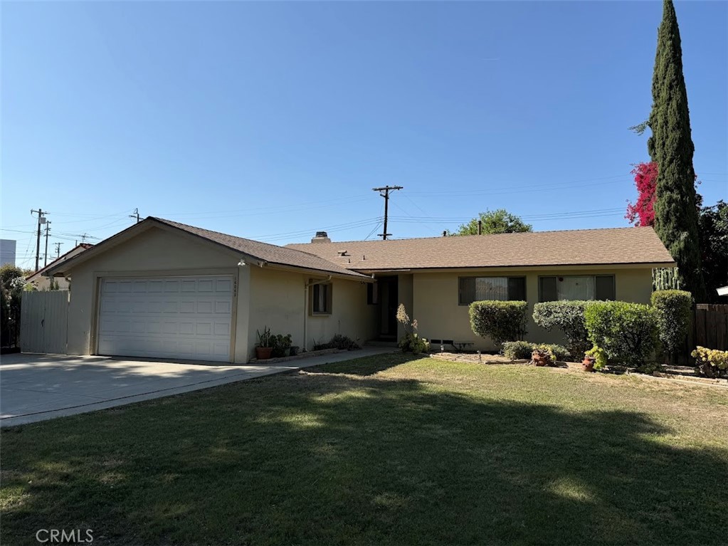 Welcome to this beautiful 3-bedroom, 2-bathroom home in North Hills, now available and ready for move-in! This home boasts a well designed floor plan utilizing the space wisely. The living room is very spacious with decorative fireplace with mantel adding a touch of charm and warmth to the living area. The kitchen has plenty of cabinet and counter space for all of your culinary needs. The large primary bedroom features multiple, super spacious closets that will cater to all your storage needs. The additional two bedrooms are well sized. There is an additional full, remodeled bathroom. Step outside to a covered patio, easily accessible from the living room with a large enclosed backyard. The homes has an attached two car garage with laundry hook-ups, central heating and air, and additional storage.