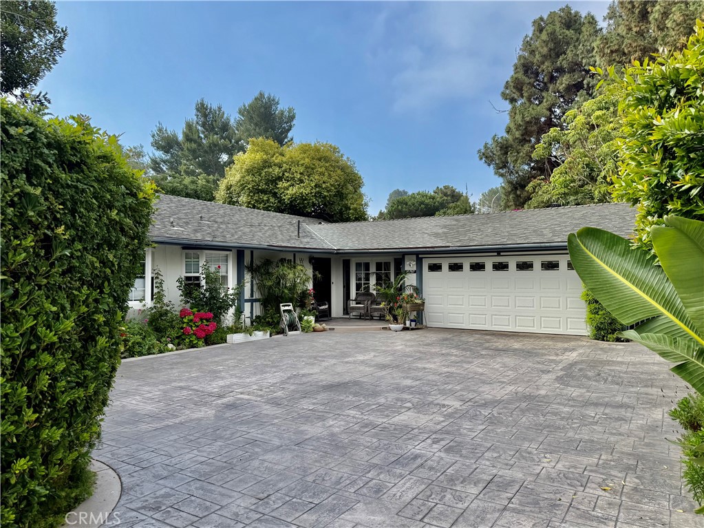 Charming Remodeled Home with City Lights Views
Experience stunning city and city lights views from this beautifully upgraded 3-bedroom (originally a 4-bedroom) home, nestled on a spacious 13,500 sq ft lot at the end od a cul-de-sac. The property features a modern chef’s kitchen with a professional Viking stove, Sub-Zero refrigerator large island. The kitchen was upgraded over the last 2 years, and recent upgrades to much of the rest of the home over the past five years. Each bedroom has its own bathroom, offering comfort and privacy. Stay comfortable year-round with air conditioning throughout.
Enjoy entertaining outdoors with a fully equipped outdoor kitchen, including a Viking grill, sink, and refrigerator, along with an inviting outdoor dining area. The expansive flat lot with room for a pool and a small orchard with mature fruit trees such as avocado, lemon, fig, and kumquat, creating a tranquil oasis. Conveniently located close to schools, this exceptional home combines luxury, functionality, and beautiful scenery.