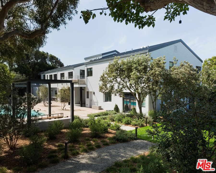 Available for immediate move-in. Stunning Cape-Cod tennis court / pickle ball estate located in the desirable Point Dume. Experience unparalleled privacy on gated and park-like grounds. The property features an elegant entry courtyard, ocean views, and is flooded with natural light throughout. The newly built residence enjoys hardwood floors, vaulted ceilings, and a spacious master suite. The sprawling property is complete with an oversized pool and media room. Located close to Dume Cove Beach and Westward Beach.