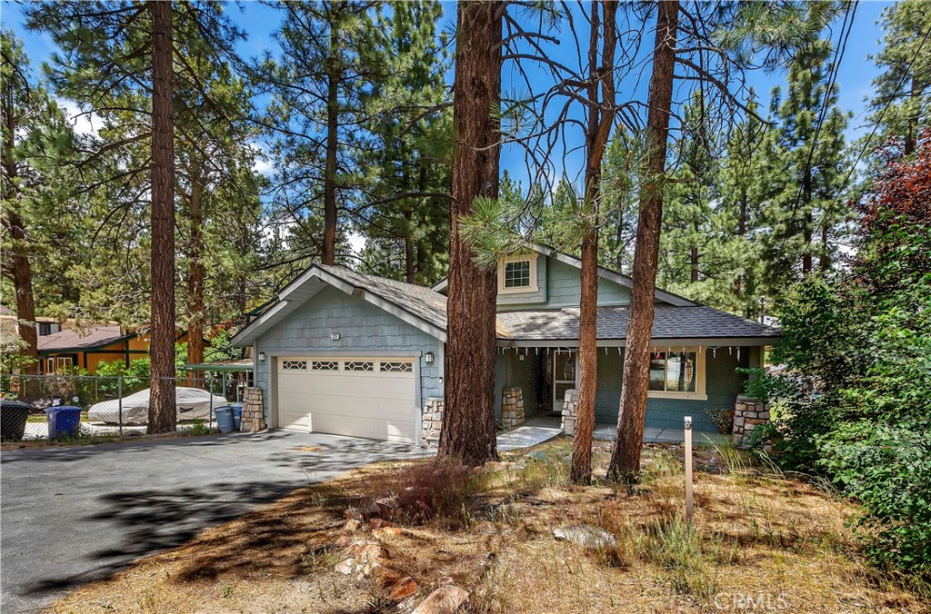 Charming 3-Bed, 2-Bath in Big Bear City! Perfectly located within walking distance to the Convention Center & Reserve Lake, and just minutes to Snow Play, ski resorts, and Big Bear Lake. Featuring an open-concept living, dining, and kitchen area, this home combines rustic charm with modern comfort. Sold with some furnishings (exclusions apply). Ideal as a full-time home, vacation getaway, or income-producing rental!