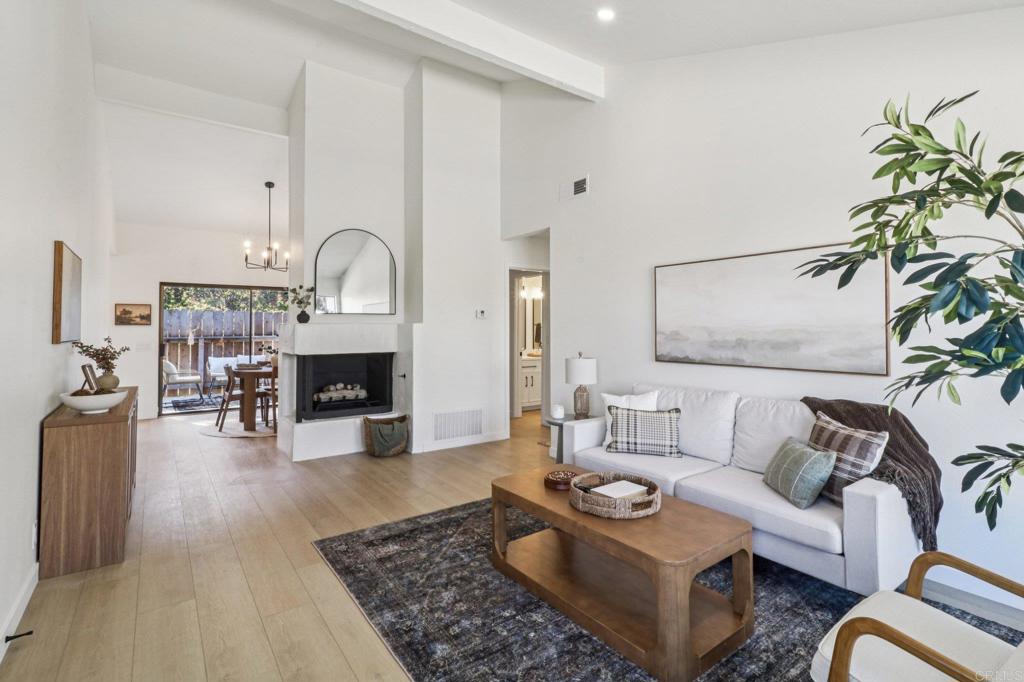 Introducing this fully remodeled 2-bedroom home in the highly sought-after Nob Hill 55+ community. Every detail has been thoughtfully updated, creating a modern and comfortable retreat. Step inside to find vaulted ceilings and a spacious floorplan filled with natural light. The home features luxury vinyl plank flooring and recessed LED lighting throughout. The kitchen shines with modern oak cabinets, quartz countertops, and brand-new appliances, offering a clean and contemporary look. Both bathrooms have also been remodeled, with the primary suite showcasing a double vanity with linen storage and a tiled shower, while the guest bath features all-new vanities and fixtures. Additional upgrades include new doors, hardware, exhaust fans, a freshly stuccoed fireplace front, and a new garage door on the finished garage. Sliding glass doors off the dining room open to a private patio, and drought-tolerant landscaping adds curb appeal out front. Community amenities include a pool, spa, and RV parking. Plus, the home is just minutes from shopping, dining, and entertainment in downtown Vista, adding to its convenience and appeal. With its stylish upgrades, thoughtful details, and prime location, this Nob Hill gem is move-in ready and waiting for its next chapter.