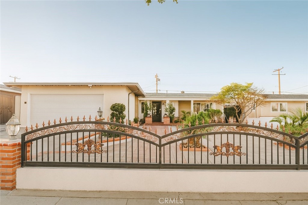 Enter this Beautiful home through the main front door into the spacious living room. The house features three comfortable bedrooms and two bathrooms. On the right side, you will find a nicely updated full bathroom and a larger full bathroom connected to the primary bedroom.The owner have invested about $70,000 in updates, including Tile flooring, Granite Countertops, New cabinets, and a lovely patio perfect for exercise. Enjoy the cozy fireplace and a large two-car garage. The property is surrounded by a Brick fence and an attractive Iron gate in the front, with charming brick steps leading to the entrance.The backyard boasts many fruit trees-too many features to mention! Don't miss your chance to own this home. Great location, Close to many restaurants, makets and more!, also the camera system with 8 eyes . Enjoy extra wonderfull partio have permited 313 sqft to build but it does not have finalled inspection.