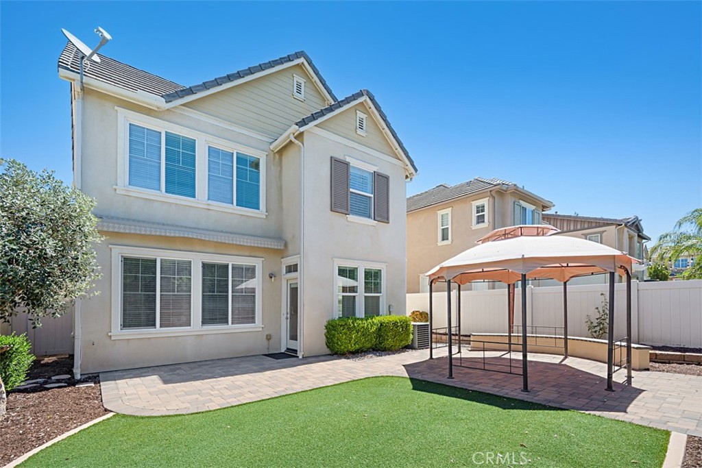 Dreaming of making Temecula's sought-after Wolf Creek Community your home? Seize the opportunity now! Luxury vinyl plank flooring runs throughout the open concept main level, including the kitchen, which features granite slab countertops and stainless steel appliances. Ready for immediate move-in, the entire home, including the 2-car garage, has been freshly painted. Beautifully tiled bathrooms bring this home up to date and ready for its new owners. Upstairs, the primary suite boasts a brand new soaking tub and spacious, zero-threshold, walk in shower, oversized walk-in, custom closet, and dual sinks. Upstairs landing features a desk area, plus large laundry room with sink which is convenient to all 3 bedrooms. The upgraded backyard is a true retreat, ready for twinkling patio lights and your outdoor furnishings, it features a patio of interlocking pavers, pergola, and drought-friendly turf. Close to top-rated schools, including award-winning Great Oak High School & Helen Hunt Elementary, Birdsall Sports Park, golf courses, restaurants, shopping, trails, two community pools, playgrounds, basketball courts, parks, bike paths, outdoor BBQ areas, a fitness center, and a clubhouse, plus Pechanga Casino. Even enjoy Pechanga's fireworks shows right from your backyard!