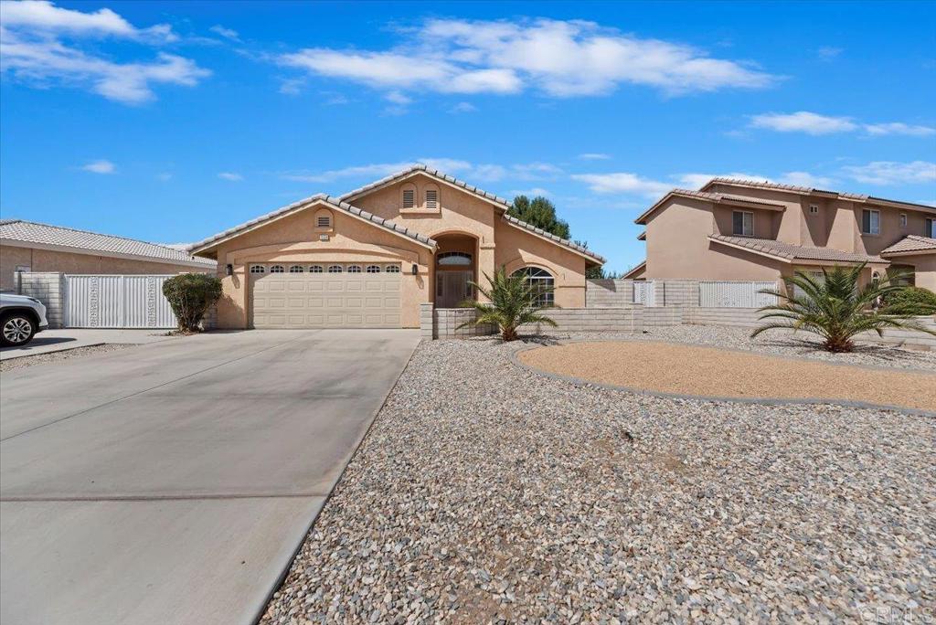 4 bedroom 2 bathroom home in Spring Valley Lake with RV parking. Enjoy the lake two blocks away, beach area, fishing areas, community center, parks, dog park. This community offers a horse equestrian center on the Apple Valley side that offers, tack rooms, horse wash area, additional arena and turnout. The Bear Valley Country Club at Spring Valley Lake offers an 18 hole course. Tennis courts, racquetball, basketball and work out in the fitness center, swim, or relax in the sauna. This oversized lot allows lots of opportunity. Enjoy the beautiful sunrises and sunsets. Covered patio and vaulted ceilings in the formal living & dining room. Kitchen has quartz counter tops, stainless steel appliances. Open concept with corner fireplace and sliding glass door to back patio. Good size guest bedrooms and guest bathroom with tub & shower combo. Extra storage closet and cabinets in hallway. Updated lighting and ceiling fans thru-out. Master Bedroom has walk-in closet. Master bathroom has tub/shower combo.