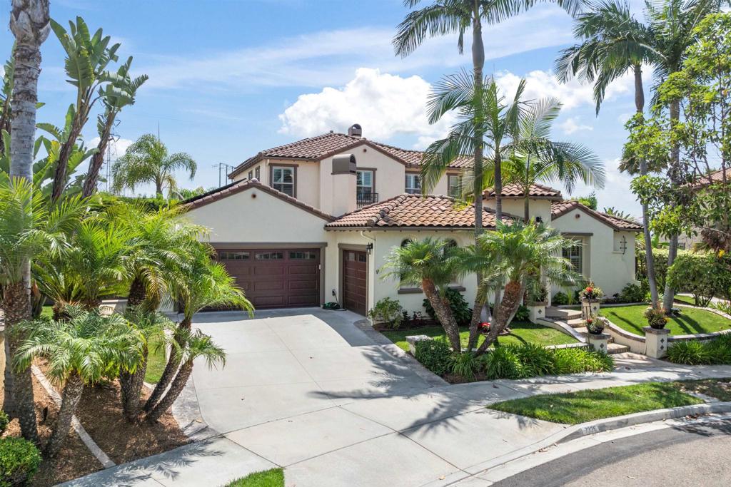 Nestled in the coveted community of La Costa Oaks, this Mediterranean-style residence offers a seamless blend of luxury and comfort, perfect for those seeking a spacious retreat with ample opportunities for entertaining and relaxation. Step inside this stunning 5-bedroom, 4.5-bathroom home, featuring 3,566 square feet of living space, and you will experience a versatile floor plan full of light that includes the primary bedroom suite and also a full guest en-suite with a separate entrance on the main level. The lushly landscaped, expansive quarter-acre lot is among the largest in La Costa Oaks, offering privacy along with fruit trees, a cascading water fountain, a spa, a fire pit, indoor and outdoor surround sound, and a built-in BBQ Island with a sink/refrigerator. The side yard is large enough for a potential pool or a small sport court. Enjoy a cozy fire in your private courtyard while hosting gatherings or simply reading a book in this delightful outdoor space. Double sets of French doors seamlessly connect the office and dining room to the courtyard, enhancing the indoor-outdoor living experience. The large gourmet kitchen boasts an oversized island, stainless steel appliances, a wine refrigerator, a large dining area, and ample cabinet space for convenient storage. Upstairs, a large loft area welcomes you to a versatile space that can serve as a movie room, play area, or game room, along with three large bedrooms, one of which features a full en-suite setup. Other features include plantation shutters, Sunrun Solar, a tankless water heater, and 3-car garage space. For those who love the outdoors, miles of scenic trails are easily accessible from the community, offering ocean views and opportunities for hiking, running, and mountain biking. The La Costa Town Square is conveniently located and provides a vibrant mix of restaurants, shops, a movie theater, and fitness facilities. Residents of La Costa Oaks enjoy access to two community pools, a gym, and a nearby park, perfect for leisurely days with friends.