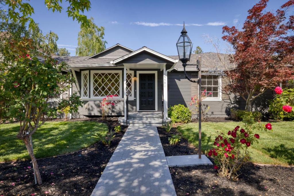 Welcome to 15591 Loma Vista Avenue, a rare blend of vintage Los Gatos charm and modern updates. Situated on a generous 10,920 sq ft lot, this single-level 5-bedroom, 2-bath home offers approximately 1,788 sq ft of living space plus almost an additional ~1,000 sq ft of bonus living area, creating endless possibilities for multi-generational living, a home office, or entertainment spaces. This home retains its warm character while featuring thoughtful updates, including updated bathrooms and kitchen. The flowing floor plan connects light-filled living spaces to a spacious backyard perfect for California indoor-outdoor living. Located in a sought-after Los Gatos neighborhood, this property offers close proximity to top-rated schools, charming downtown shops, and scenic parks. With its large lot and prime location, this home is an exceptional opportunity for those seeking space, comfort, and value in one of Silicon Valleys most desirable communities.