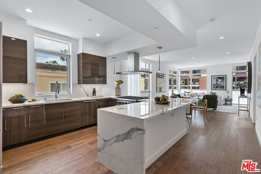 Located in the prestigious Beverly Hills Golden Triangle, this stunning architectural gem offers the epitome of luxury in a prime location renowned for world-class shopping and dining. Meticulously crafted, this rare luxury property (built 2023) is a premier offering in an area where newly built apartments are scarce. Experience the ultimate luxury lifestyle in this  stylish two-bedroom, two-and-a-half-bathroom, ~1,463 SF residence with top-of-the-line appliances, tons of windows and light, high-ceilings, EV charging stations, and magnificent community rooftop entertainment. Enjoy unparalleled convenience with close proximity, just a block or so away, to iconic shopping destinations like Chanel, Louis Vuitton, and Prada. Savor exquisite meals at renowned restaurants such as Il Pastaio, La Scala, and Spago, all just a few blocks away. Whole Foods is across the street! 250 N. Crescent Drive offers an unmatched living experience in the heart of Beverly Hills.