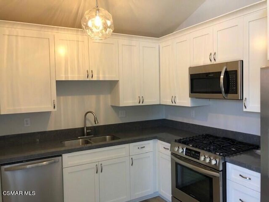 Remodeled 2 bedroom, 2 bathroom condo on the second floor.  Kitchen has newer cabinets, newer Stainless Steele appliances and newer counters. Spacious living room with gas fireplace, vaulted ceilings and dining area. Newer dual pane windows and Slider to patio.  Primary bedroom has walk in closet.  Water and Trash included in rent. Beautiful grounds  One covered carport and one additional parking space.  Gated complex.   Close to parks, schools, local restaurants and shops. Second Floor, no elevator.  Community Laundry facility. Non smoker and no pets.