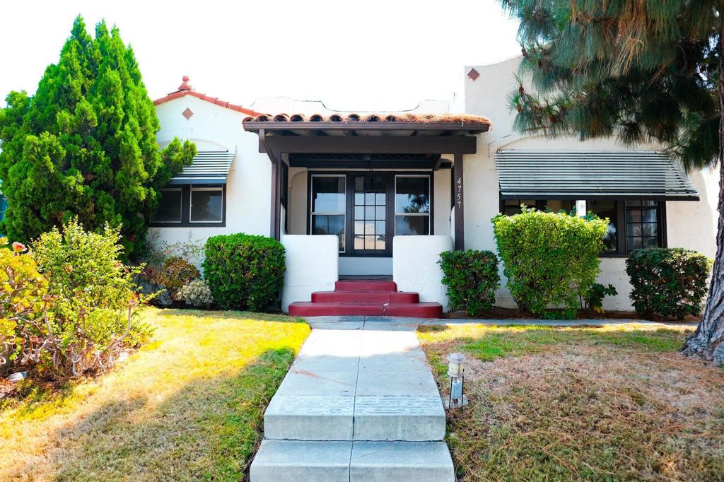 Kensington Charmer with Detached ADU & Alley Access! Located on one of Kensington’s most iconic tree-lined streets, this stunning Spanish Revival residence blends timeless character with modern flexibility. The front home is a beautifully preserved 2-bedroom, 1-bathroom single-family residence offering 1,022 sq ft of living space, classic architectural details, a 1-car garage, mature landscaping, and a private, tranquil backyard—ideal for relaxing or entertaining. At the rear of the property, with its own alley access, sits a fully detached and separately metered ADU. This 2-bedroom, 2-bathroom unit features 864 sq ft, a charming front deck, dedicated laundry room, and a spacious 2-car garage. Two additional single-car garages offer abundant storage space or the potential for additional rental income. With possible room to expand or create a third unit (buyer to verify), this rare offering provides multiple living options—perfect for multigenerational households, rental income, or a live-in-plus-investment setup. All within walking distance to Kensington’s vibrant shops, cafés, and community life.