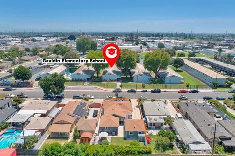Photo of 12327 Dunrobin AVE, Downey, CA 90242 (MLS # RS26132584)