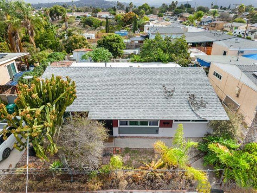 Lovely private haven that has been occupied and cared for by 2 families since the 1960's. A 4 bedroom and 2 full bath bathroom home with a new roof, and newer dual pane windows, covered rebuilt patio. Updated flooring and remodeled bathrooms. Low maintenance landscape and drip irrigation system with an oversized lot and a 35 year old Fuerte avocado tree yielding more fruit than only one family can use. Established succulent gardens. Upgraded electrical and lighted outdoor BBQ. Home is walking distance to Audubon school K-8th grade and public transportation is one block away. Large enough yard enough yard for multiple ADU's, families and Investors welcome!!
