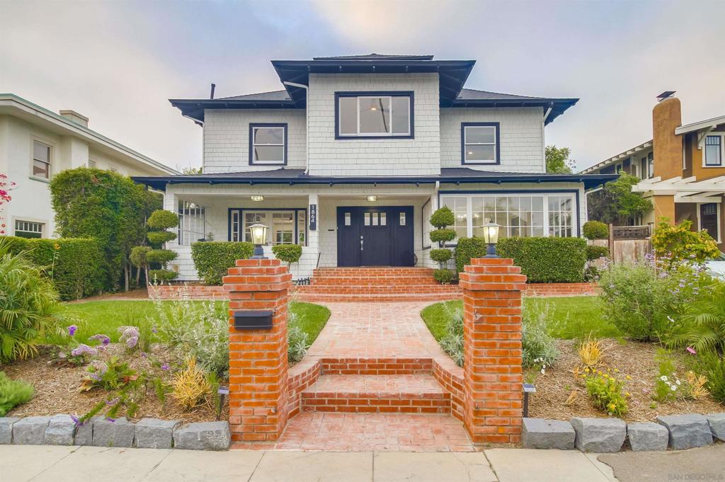 Timeless elegance offering a generous family compound on the iconic and tree-lined Sunset Blvd, located in the highly sought after North Mission Hills community. Stunning coffered ceilings, a showcase fireplace, and LaCantina doors create a seamless indoor and outdoor, open-concept dining and living atmosphere. Entertain loved ones in a chef’s kitchen, sip tea at the breakfast bar, and admire your plant loving, book reading sanctuary in the charming sunroom with picturesque bay windows looking out on views of the community! A canvas for outdoor enthusiasts, garden lovers, pet lovers, and children awaits in the expansive tree-shaded backyard that offers terraced landscaping and is fully fenced with additional parking! Upstairs, four spacious bedrooms await, including a primary retreat with a zen inspired soaking tub and walk-in shower room. The third floor flex room is the perfect den for crafts, a playroom, or additional storage. Perched above a rare detached 3 car garage is a 440 SF one bedroom, one bathroom ADU with a kitchenette and its own balcony and entry! Perfection awaits for multi-generational families in need of a separate second home or a buyer desiring a robust rental income - the options are unlimited! The magical and historic Mission Hills neighborhood is a central yet quaint metro San Diego location that offers good schools, award-winning eateries, treasured parks, stunning architecture, and local shops right outside your front door.
