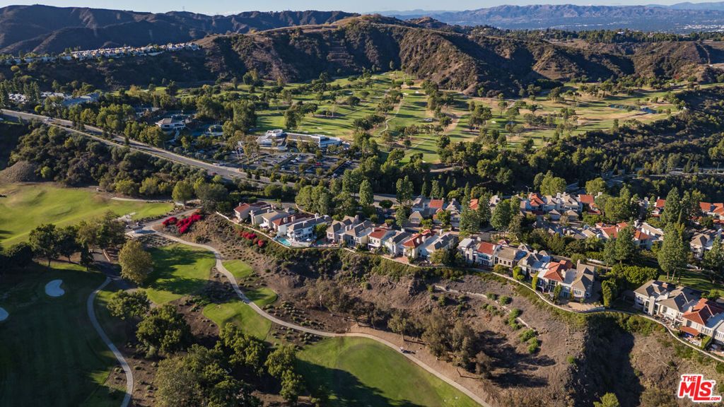 Photo of 12386 Ridge Circle, Los Angeles, CA 90049 (MLS # 25610321)