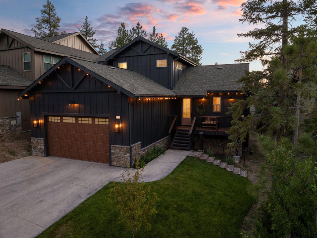 Don't miss seeing this stunning home just on market! Easy to show and priced to sell! Discover mountain living at its finest in this stunning 4-bedroom, 3.5-bath custom home in The Pines, a modern, high-end development centrally located near the lake, village shops and restaurants, and both mountain resorts for year-round adventure. Spanning 2,600 sq ft on a 7,100 sq ft lot, this professionally designed home features an open-concept dining and living layout perfect for entertaining large families both in and out, with a gourmet kitchen, enlarged pantry, enlarged laundry room, many luxury finishes, and a huge furnished back deck. Thoughtfully curated by the artist/interior designer/owner, the home is filled with thoughtful premium upgrades and unique personalized touches that add to the overall comfort and beauty of the home that you won't find in other Pines properties--custom cabinetry, high-end fixtures, master and guest room ensuite, landscaped front yard, high end materials (soapstone countertops in kitchen, and more. The spacious bedrooms include a private primary suite with spa-like clawfoot tub and stunning marble shower, guest bedroom ensuite and two bedrooms connected by a jack and jill bath, while the two-cargarage and generous outdoor space provide both convenience and comfort. Brilliantly decorated byowner/artist/ interior designer with unique touches This home exemplifies modern luxury andexquisite design with a down to earth mountain feel that makes you feel right at home! Ideal as a full-time residence, mountain getaway, and/or high-performing vacation rental, this one-of-a-kindproperty offers unbeatable value, location, and lifestyle in a thriving, upscale community. This home is currently a vacation rental with Big Bear Vacations! Please make sure to check list of upgrades attached to MLS. Thanks for showing!