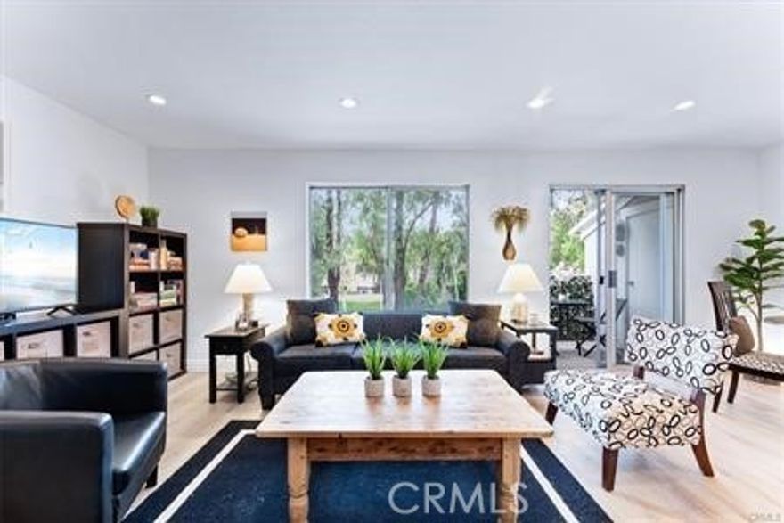 Welcome to this beautifully updated one-bedroom, one-bathroom condo perfectly situated on the second floor in the Niguel Vista community in the heart of Laguna Niguel. Being 2 miles from the ocean, consider this coastal living at its finest!  With new luxury laminate flooring throughout and a fresh, modern paint palette, this home offers a warm and inviting atmosphere from the moment you walk in.  The open-concept kitchen seamlessly flows into the dining area and living room, creating the ideal space for everyday living and entertaining. The kitchen showcases white cabinetry, sleek quartz countertops, and brand-new appliances including a stove, dishwasher, and microwave. A refrigerator and stackable washer/dryer are also included—making this home truly move-in ready.  Step out onto your private balcony off the dining area, perfect for enjoying morning coffee or relaxing in the evening. The bedroom features a ceiling fan, mirrored closet doors, and a cedar-lined closet interior, while the bathroom offers modern quartz countertops and a tub/shower combination. This intimate community includes access to a sparkling pool and spa, giving you the best of Southern California living in a quiet, well-maintained setting. Conveniently located near shopping, dining, and just minutes from the beach—this charming condo is the perfect opportunity for first-time buyers, investors, or anyone looking to enjoy the Laguna Niguel lifestyle.