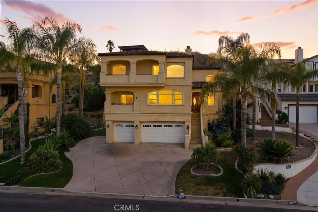 Welcome to this beautiful Canyon Lake residence, perfectly positioned to capture breathtaking views from both the second and third-floor balconies. As you step through the front door, you’re greeted by an expansive open floor plan filled with natural light. The modern kitchen features granite countertops, shaker wood cabinetry, and a spacious layout that seamlessly connects to the living room, dining area, and sitting space—ideal for entertaining and everyday living. Large windows frame the lake views, offering a serene backdrop to your mornings.
Upstairs, the oversized primary suite is a true retreat with its own private balcony. The luxurious en-suite bathroom boasts dual sinks, granite finishes, a jacuzzi soaking tub, and a large glass-enclosed shower. Just down the hall are three additional spacious bedrooms and a full bath.
The entry level also includes a convenient half bath and leads down to the impressive 5-car garage, complete with an optional 6th bedroom, office, or game room, plus extra storage. Outside, you’ll find RV/boat parking and additional driveway space for at least three vehicles.
One of the home’s most unique perks: enjoy front-row seats to Canyon Lake’s premier annual fireworks show—right from your balcony!
Living in Canyon Lake means access to incredible amenities within this private, gated, 24/7 security-patrolled community. Residents enjoy a private lake, golf course, clubhouse with restaurant, tennis courts, beaches, parks, a campground just steps from your door, and year-round community events.
This is more than a home—it’s a lifestyle. Welcome to your next chapter in the highly desirable Canyon Lake community.