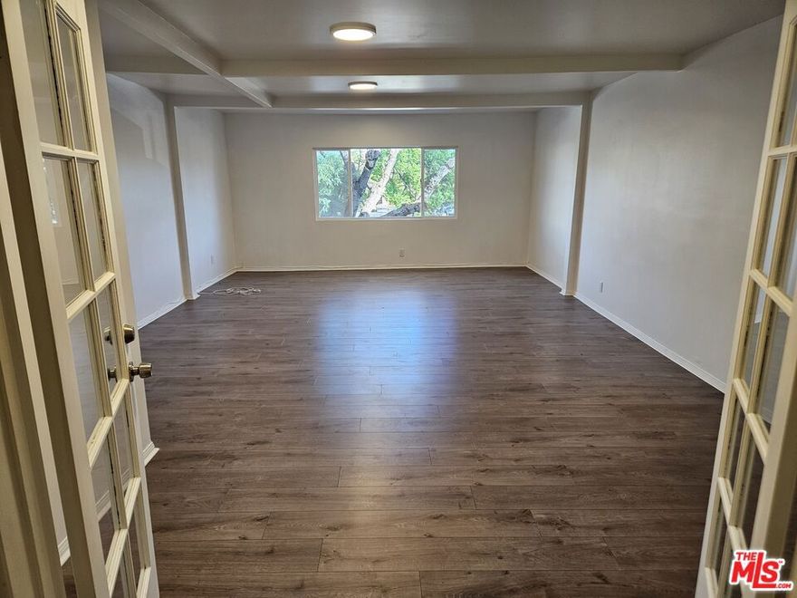 4 BED  AND 2 BATH APARTMENT! FULLY RENOVATED KITCHEN WITH UPGRADES TO THE BATHROOMS! COME SEE THIS COZY WORK LIVE SPACE ON THE SECOND FLOOR OF A RETAIL CENTER. CONVENIENTLY LOCATED ACROSS GELSON'S. NATURAL LIGHTING AND PRIVACY. THIS ONE WON'T LAST!