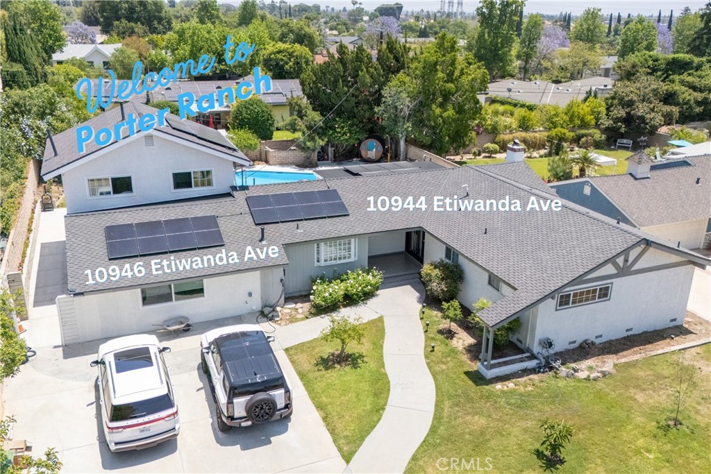 Welcome to 10944 & 10946 Etiwanda Ave, a fully updated and versatile property on an expansive 11,180 sq ft lot in one of the Valley’s most desirable neighborhoods. The main home features 3 bedrooms and 2 full bathrooms, thoughtfully remodeled with modern finishes throughout. The expansive chef’s kitchen is a standout, boasting double ovens, premium cabinetry, and ample counter space. Additional upgrades include a presidential roof, brand-new HVAC systems, and updated electrical with solar panels ensuring comfort, efficiency, and peace of mind for years to come.
Out back, enjoy a stunning pool, sleek finished concrete hardscape, and a spacious backyard perfect for entertaining or relaxing under the patio.
Attached to the main home is a two-story ADU featuring 2 bedrooms, 1.5 bathrooms, its own patio and private backyard. Currently leased for $3,700/month, it’s an ideal setup for multigenerational living, guest quarters, or passive rental income. The main house and the ADU feel like separate houses as you have a seven foot tall vinyl fence separating both of its backyards. There's ample parking on the driveway with RV potential as well as two EV charges.
Located within boundaries of award-winning schools like Darby Elementary and Granada Hills Charter High, and just minutes from hiking trails, shopping, dining, and major freeways—this property offers the perfect blend of luxury, functionality, and location.
Whether you’re an investor, a large family, or a buyer seeking flexibility and value in a move-in ready home—this is the one you’ve been waiting for.