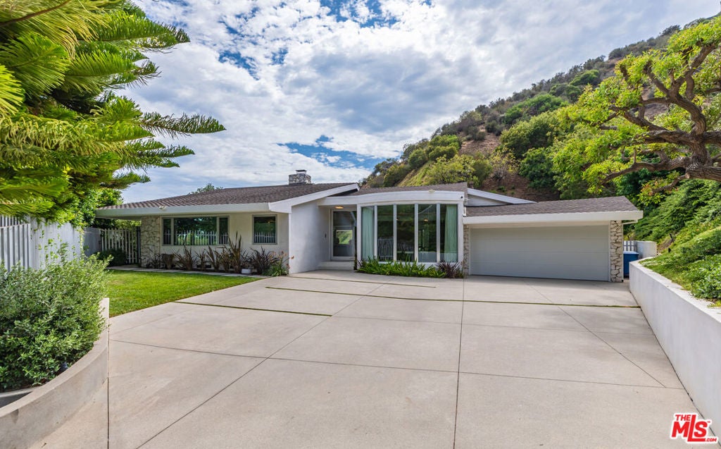 1667 Rising Glen Road, Los Angeles CA 90069
