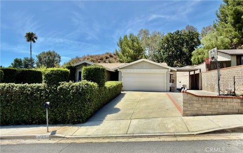 Photo of 23228 Redbud Ridge CIR, Valencia, CA 91354 (MLS # SR26162056)