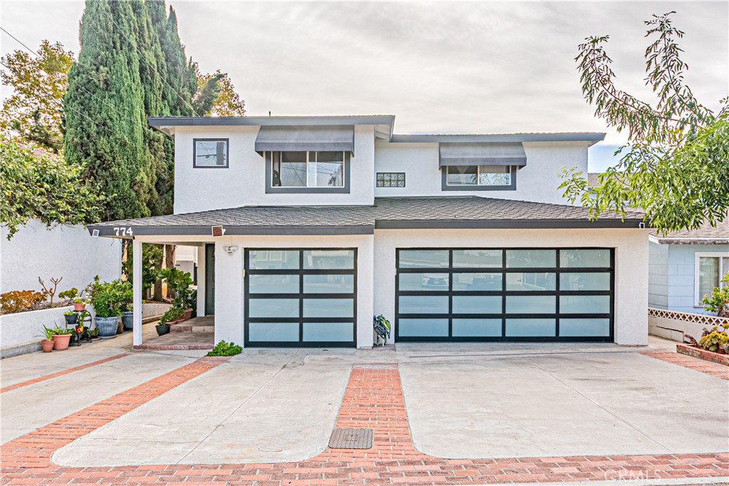 Welcome to this beautifully remodeled home nestled on a quiet street in one of Fullerton’s most desirable neighborhoods. Offering 5 spacious bedrooms and 2.5 fully upgraded bathrooms, this property is thoughtfully updated and full of potential — whether you're looking for a forever home, guest accommodations, or long-term rental opportunities.
Inside, you're welcomed by a warm living room featuring a cozy fireplace, which flows seamlessly into the kitchen and dining area. French doors open out to a private backyard oasis with a swimming pool and deck — perfect for entertaining or relaxing.
In addition to the main living areas, the property features two fully remodeled bonus rooms, each with their own updated private bathrooms — perfect for use as a guesthouse, home office, or creative studio.
Recent major upgrades include a brand-new roof, giving you peace of mind and improved energy efficiency for years to come.
Additional highlights include:
All bathrooms throughout the home have been tastefully upgraded
Engineered wood flooring
Recessed lighting throughout
Central heating & air conditioning
Upgraded 3-car garage with modern door & systems
Additional parking in front of the home
Detached bonus room with backyard access — ideal for a quiet workspace or retreat
Private backyard with a beautifully maintained multi-tiered garden and room for a playground or outdoor lounge area
This turnkey property offers the perfect blend of comfort, style, and versatility — all in a prime Fullerton location. Don’t miss your chance to make this one-of-a-kind home yours!