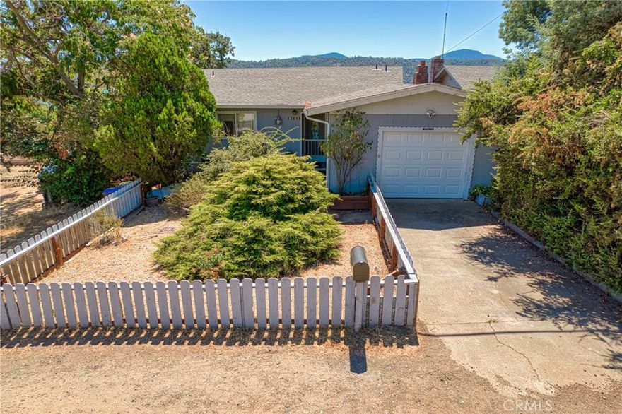 Mid-Century Modern Charmer with Views of Clearlake And a Rental Unit~



Discover this 2-bedroom, 2-bath mid-century modern gem, where timeless design meets serene lake living. The large family kitchen offers tons of storage, perfect for all your culinary needs. Enjoy the comfort of oversized bedrooms and a spacious living room that flows seamlessly into an attached sunroom, ideal for soaking up natural light. Off the dining area is a covered back deck to take in breathtaking views of Clearlake while watching the sunset. BONUS ~ the property includes a 1-bedroom, 1-bath rental unit, ideal for guests or additional income. This property is a rare find—combining beauty, comfort, and investment potential.