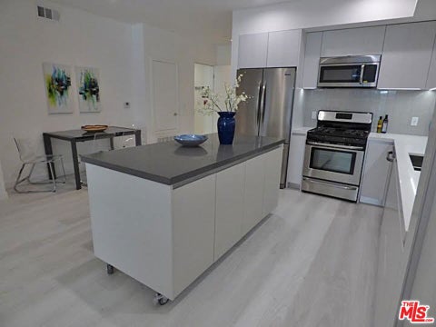Photo of 1526 ARMACOST Avenue #102, Los Angeles, CA 90025 (MLS # 26847659)