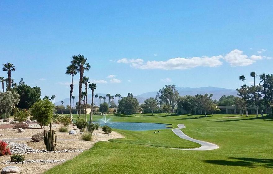Gorgeous Golf Course condo. ***TURNKEY FURNISHED!*** Light and Bright with dual master bedrooms on opposite ends of the home for added privacy. Located inside the gates of the beautiful Desert Princess Country Club and just minutes from Downtown Palm Springs. With views from every room, this delightful condo features 2 spacious ensuite bedrooms both accessing the covered patio, and bathrooms featuring dual sinks, each with its own walk-in closet. High ceilings throughout the home complete with lake, golf course, pool, fountain, and desert views from your patio, living room, and both bedrooms. The adjacent heated pool and spa feels like your own private resort just outside of your back glass sliders. The home also includes in-unit washer and dryer and detached private garage.  Front patio with western mountain views. LOW Land Lease to 2069; only $160.50 a month.  Short-term vacation rentals are permitted at the Desert Princess, outstanding rental history with this home. Own a part of the most affordable gated Country Club in the Coachella valley. Desert Princess is known for its many wonderful amenities, offering 27-hole PGA Championship golf course, discounts and preferred tee-times for Owners, no Tee-time lotteries, no initiation fees, and rated among the best courses in the valley by GOLF DIGEST. HOA includes a social membership, cable TV & high speed WiFi internet, membership to Health and Fitness Center, over 35 sparkling swimming pools each with a spa for your enjoyment, grounds and exterior maintenance including roof, pest control, 10-tennis courts, pickleball, bocce ball, state-of-the-art fitness center, saunas, a full service spa that provides massages, facials, and full body treatments, a clubhouse, restaurant, driving range, and racquetball courts. 24 hour guard gated community. This quiet community is just minutes from the world that is Palm Springs; restaurants, shopping, casinos, an international airport, the Tramway, Art Museums, Theaters, Acrisure Arena, and Street Fairs.  Perfect as a desert getaway, full-time residence, or investment property!
