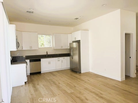 Photo of 6849 1/2 De Celis Place, Van Nuys, CA 91406 (MLS # SR26122950)