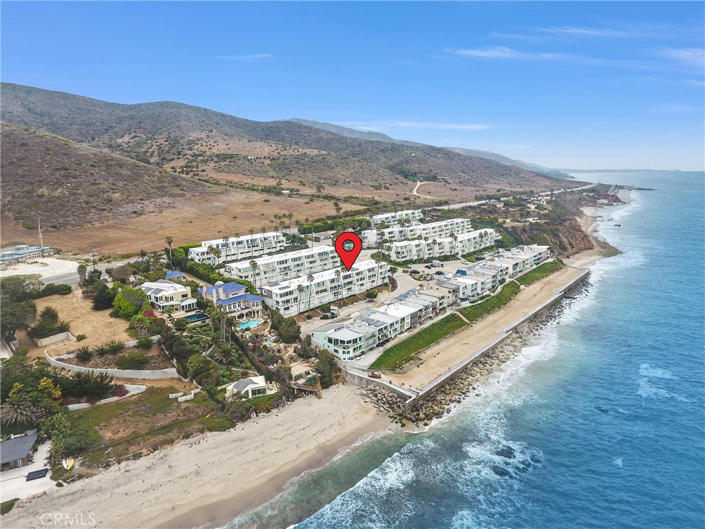 Experience elevated beach living in this newly rebuilt, single-level designer studio located in the exclusive, gated Malibu Bay Club. Perched on the ocean side of the community, this coastal retreat offers stunning panoramic views, salty sea breezes, and golden sunsets from a spacious private deck—perfect for morning coffee or evening wine.
Inside, no detail has been overlooked. The open-concept layout features a sleek, modern kitchen with high-end finishes, a spa-inspired bath, and in-unit laundry for added convenience. Every inch has been thoughtfully curated to reflect effortless coastal luxury.
Just a short scenic drive to Trancas Country Market, you'll have easy access to Malibu’s best boutiques, gourmet markets, and local dining favorites.
Whether you're looking for a serene weekend escape or a dreamy full-time residence, this oceanfront oasis is a must-see.