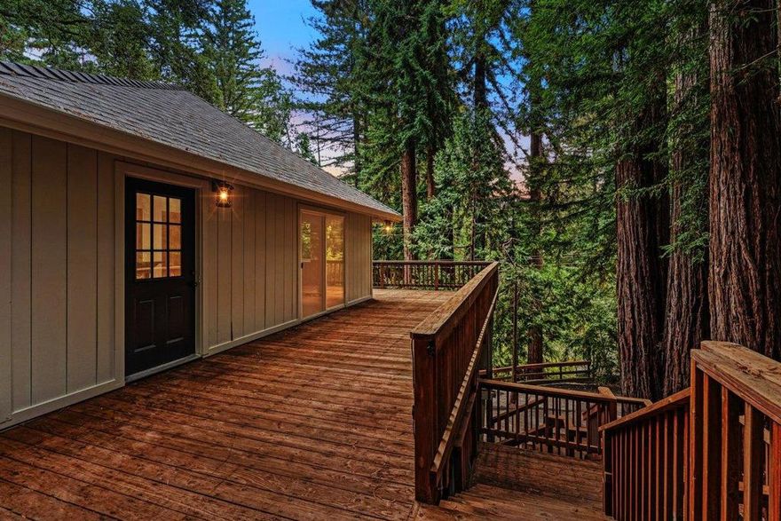 Surrounded by redwoods, yet full of light and tucked near the end of a quiet road, this 2-bedroom, 1-bath home is the perfect place to unplug and unwind. The kitchen offers a warm, welcoming space to cook and gather, while the newly remodeled bathroom adds a fresh, modern touch. With a new roof and septic tank already in place, much of the work has been done, so you can focus on enjoying the setting. Step out onto the expansive deck and take in the stillness of the forest, where the only sounds are the breeze and the birds. Whether youre looking for a weekend getaway or a peaceful place to call home, this mountain retreat offers the serenity thats hard to find and even harder to leave. Home is virtually staged and digitally enhanced in some of the pictures.