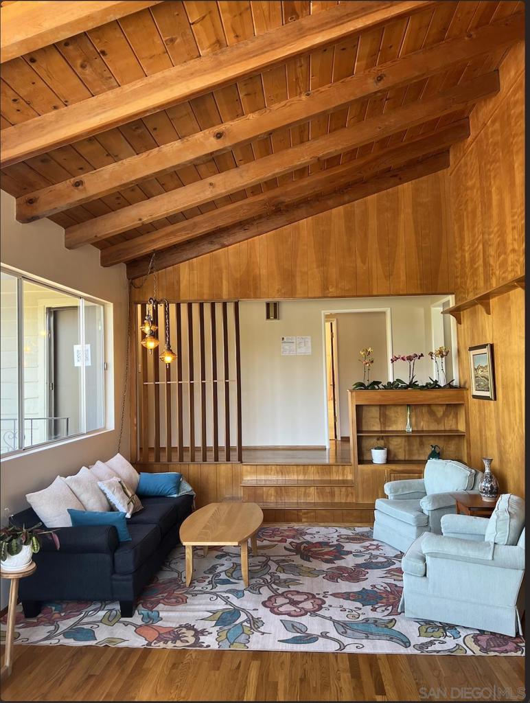 Mid-Century Modern Gem with Views, Vintage Charm & Private Orchard ? Step into a piece of history with this custom-built 1,689 sq. ft. mid-century modern masterpiece—only the second owner (since 1965)! Thoughtfully updated while preserving its original charm, this 3-bedroom, 2-bath beauty features a storybook Cinderella tub, clean architectural lines, and warm character throughout. Modern upgrades bring peace of mind: new tankless water heater and water softener, newer bedroom carpet, R-38 attic insulation, full waterproofing and drainage system, 200-amp electrical panel plus 100-amp garage subpanel with EV-ready plug, and updated furnace, ducts, oven, and cooktop.Outside, enjoy your own orchard with apricot, orange, peach, plum, pomegranate, lime, and lemon trees—perfect for low-maintenance living yet spacious enough for the avid gardener. Soak in breathtaking Mount Helix views from multiple rooms. Entertain in style on the spacious rear patio with ceiling fan, or host sunset gatherings on the upper patio with sweeping vistas. With easy freeway access, great schools and a rare blend of mid-century style, modern upgrades, and natural beauty, this home offers a lifestyle you’ll love coming home to. Your dream mid-century retreat awaits—schedule your private tour today!