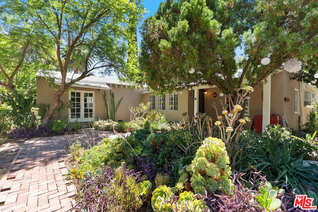 Two lots. One price. This property brings together nearly 14,600 sqft across two combined parcels with a single-story 3-bed, 2-bath home, detached garage workshop, and additional outbuildings. For an owner-user, this is a rare chance to create a true compound, an everyday oasis with room for ADUs, resort-style outdoor living, and private quarters for extended family, all while enjoying the scale and seclusion of a property that feels worlds away from the neighborhood around it. For investors and builders, the site offers SB9 potential with wide frontage, deep dimensions, and an LAR1 setting that has consistently supported new construction and long-term value. Located in Van Nuys with Central Valley access, the property balances convenience with opportunity.