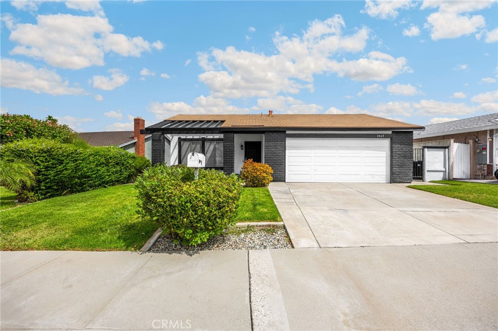 BEAUTIFUL, SINGLE-STORY home in a quiet neighborhood in Corona! This home features a bright and open floor plan with 4 bedrooms, 2 bathrooms with 1,312 square feet of spacious living space. You are welcomed at the entry into the living room which features a cozy fireplace and large windows for natural lighting. The kitchen includes plenty of cabinetry for storage, gas range, breakfast nook and is open to the family room, which makes it great for entertaining. The family room includes entertainment center, cozy fireplace and direct access to the backyard. The Primary Bedroom Suite features a spacious bedroom area and private bathroom. Down the hall, there are 3 spacious which offer plenty of closet space, and a beautiful hall bathroom with shower/tub combo. The private backyard includes large, covered patio area, large deck with spa and mature landscaping. Additional features of the property include spacious 2 car garage. HOA amenities include Lake, Pool, Pickleball Courts, Tennis Courts, and Sport Courts. This home is located close to Corona High School and is close to restaurants, shopping and entertainment. Come view this beautiful house and make it yours today!