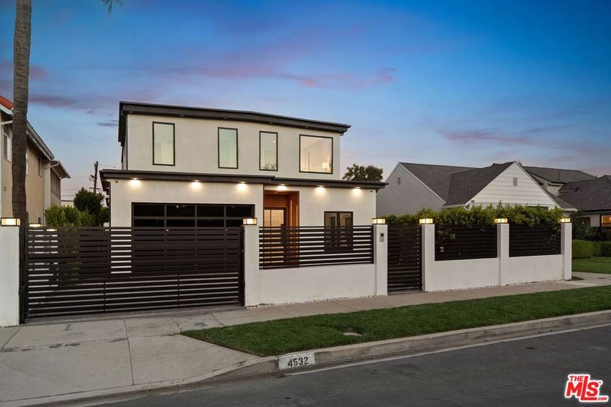 Newly constructed in 2024 this gated home sits behind hedges in the coveted and convenient Library Square area of Sherman Oaks. Fresh wide plank white oak hardwood floors look stylish and contemporary, From the impressive entrance with oversized pivot door to the smart home system that controls lighting, speakers and cameras, to the micro cement paint this contemporary home feels well built. The first floor features a custom kitchen with new Thermador appliances, wood paneling, an open floor plan with a living room fireplace and bifold glass doors that create an indoor-outdoor experience with the backyard and pool. The first floor has an office with an ensuite full bath and laundry room. On the second floor are 3 spacious, light-filled bedrooms, The ensuite washrooms finished with the most stylish materials currently available and to a very high standard. Double paned windows, high efficiency central heat and air conditioning, and solar panels create a comfortable and energy efficient home. A pool house with a full bath is the perfect place for kids to play or to rinse off after a swim. Finally, the rooftop deck offers jaw dropping views of the friendly neighborhood.