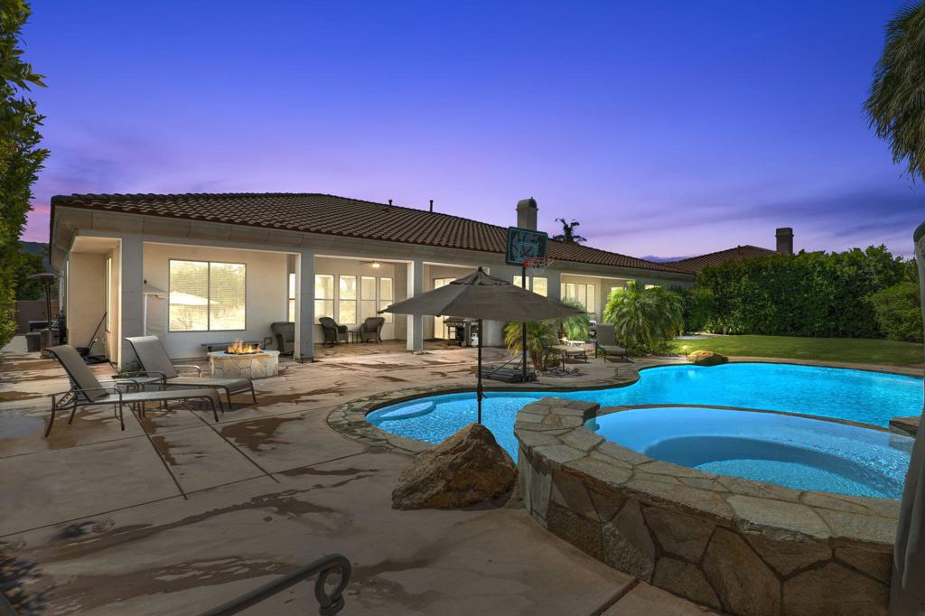 Welcome to this stunning 4-bedroom, 5-bathroom estate located in the highly sought-after gated community of Talante in La Quinta. Offering 3,640 sq. ft. of elegant living space, this home boasts a desirable split floorplan with four en suite bedrooms, each featuring its own walk-in closet, ensuring comfort and privacy for all. From the moment you arrive, you'll be impressed by the upgraded wrought iron double door entry and striking curb appeal. Step inside to find travertine flooring, coffered ceilings, and a layout designed for both grand entertaining and relaxed everyday living including a formal dining room and sun room off the master suite. Situated on a generous cul-de-sac lot, the beautifully landscaped backyard is an entertainer's dream with a newly built pool, perfect for enjoying warm desert days. Additional highlights include a spacious 3-car garage, low HOA dues, and a prime location close to the Empire Polo Grounds, Indian Wells Tennis Garden, world-class golf courses, fine dining, shopping, and top-tier entertainment. This exquisite Talante home truly blends luxury, privacy, and convenience--a rare opportunity in the heart of La Quinta.