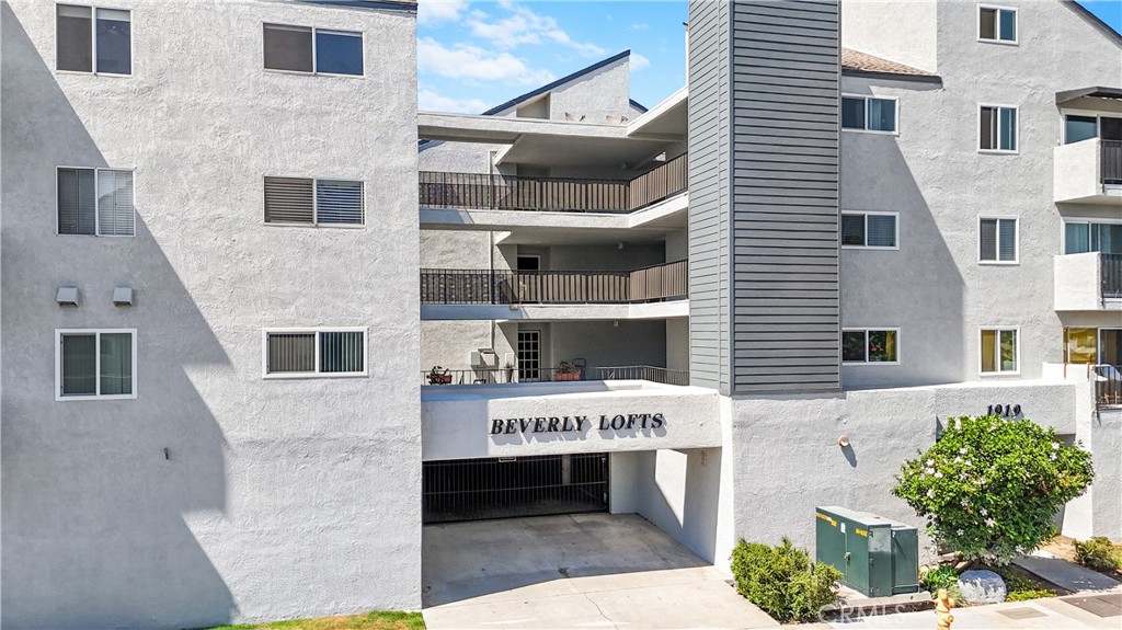 Welcome home to a 2-bedroom, 2-bathroom condo, unit #103 in the beautiful city of Long Beach. The unit includes a stackable washer and dryer, and a newer refrigerator and stove in the kitchen and a kitchen counter bar. There is a built-in bookshelf in the living room, a fireplace, fireplace, sliding glass doors that lead to a large balcony patio area. The large Master Suite includes a custom-built closet, dual sinks and large bathroom with a separate restroom. There is one common wall. The condo complex is a gated community, with access to two parking stalls, on onsite workout room, elevator access, common laundry room and there is also a spacious community seating area that has a barbeque grill for entertaining.