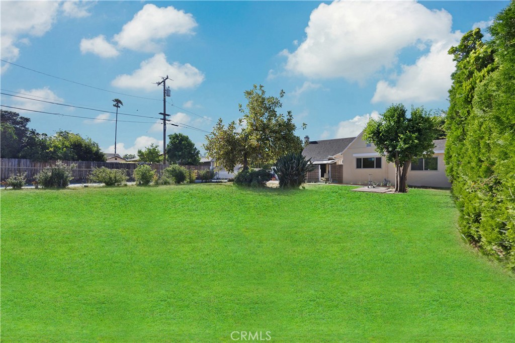 Welcome to this beautiful remodeled traditional home located in the Temple City School District.Rare find Huge Lot 12225 sqft perfect for outdoor entering and relaxation,it features 4 bedrooms and 2 bathrooms.Entering through the front door you are greeted by formal living room with huge window.The open floor plan allows for seamless transitions between rooms&entends out to the beautiful front yard ,creating a wonderful indoor-outdoor living experience.Many upgrades including newer interior paint,newer kitchen cabinets&newer granite kitchern countertops with newer exhaust hood,The expansive yard offers endless potential: build a ADU,add a pool or create your dream outdoor entertainment space.This home is conveniently located near schools,the library,public transportation,shopping centers,public parks,and all the amenities of Temple City and surrounding cities.Only a 5 minute drive to 1-10 fwy.
