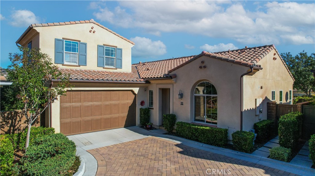 Welcome to your new home in the prestigious 55+ GATED community of Gavilan Sendero, the only gated community within award-winning Rancho Mission Viejo. Step into easy living. This move-in-ready home blends an open, modern layout with thoughtful room separation for real privacy and calm. The great room soars with high ceilings and natural light, leading to an upgraded kitchen with abundant cabinetry, premium appliances, and an oversized island that anchors everyday life and weekend hosting. Upstairs, a flexible loft adapts to your needs—perfect for visiting grandkids, a game lounge, or a comfortable guest retreat. On the main level, the den/office can convert to a third bedroom in minutes. Outside, enjoy a beautifully landscaped, low-maintenance backyard designed for effortless entertaining and quiet evenings alike. Enjoy a resort lifestyle at multiple clubhouses like the Hacienda, The Getaway, The Outlook, The BBQ Barn, with extensive amenities including a fitness center, salt-water pool, spa & cabanas, bocce ball, yoga studio, fire pits and tv screens. Plus, when you have the grandkids in town, you’ll have access to all the Award Winning RMV community amenities for those of all ages.
