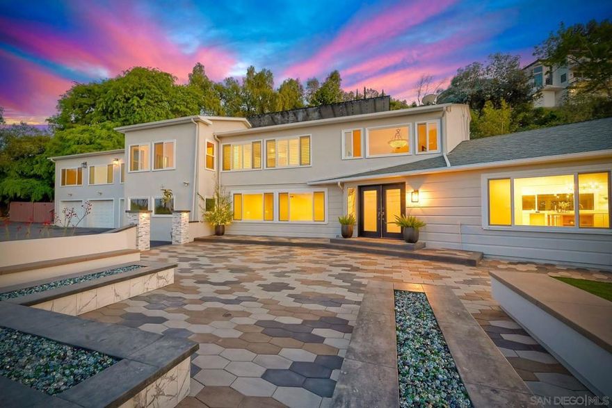 9945 Alto Drive is an architectural retreat nestled in the coveted hills of Mt. Helix, where sweeping views, elevated privacy, and creative possibility converge. This expansive 5-bedroom, 5-bath home offers over 5,000 sq ft, which includes a large 1-bedroom and 1-bathroom ADU-like retreat upstairs. It’s bathed in natural light and designed to inspire. From its dramatic vaulted and wood-beam ceilings and statement, brand-new, custom-built kitchen to its outdoor oasis for entertaining, gardening, and custom fire-fit and seating area for breathtaking sunset views, every space invites you to breathe, entertain, and envision what’s next. The layout is flexible and ready to evolve and here’s the magic: the seller is offering custom layout consultation and a potential design-build credit with purchase. Whether you’re dreaming of a reimagined primary suite downstairs or a bespoke live-work sanctuary, the framework is here. You bring the vision; we’ll help you build it. The terraced backyard offers multiple outdoor zones for entertaining, gardening, or simply taking in the sunset with a glass of wine poolside. Perched high above the city bustle but just minutes from the best of La Mesa, this home blends tranquil luxury with modern convenience. This is not your standard home and that’s exactly the point. Private showings available. Seller open to creative offers. Bring your ideas, your dreams, and your designer.