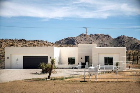 Photo of 59621 Mesa Drive, Yucca Valley, CA 92284 (MLS # JT26048942)
