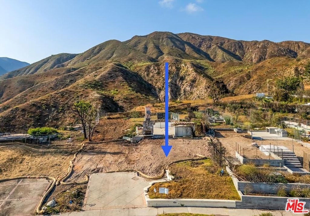 Set on a cul-de-sac with ocean and mountain views, this 11,000+ sq ft lot presents an exceptional chance to build a new home in one of Palisades/Malibu's most desirable neighborhoods. Clifftop Way is one of the few flat streets in the are ideal for walking, biking, and convenient construction access. Perfectly positioned just above the iconic Getty Villa and minutes from Malibu, Pacific Palisades, and Santa Monica, this exclusive Westside enclave lies within the coveted Malibu/Santa Monica school district. Whether you're seeking a serene coastal retreat or a home near city amenities, this location delivers both. Previous home was approx 2,286 sq ft. The lot has had Phase 1 EPA clearance and Phase 2 debris removal completed. Underground electrical utilities. CC&Rs in place with ocean view protections (buyer to review and satisfy self in all regards; broker/agents make no warranty as to the same). Lot is in Coastal Commission. See DOCS for Offer Guidelines.