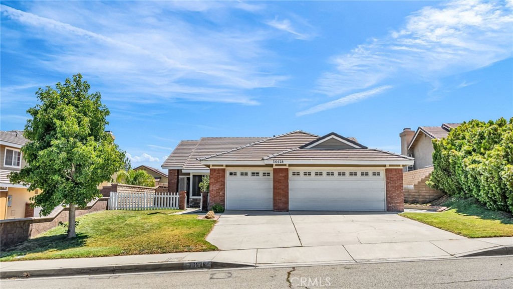 Welcome to this spacious and well-cared-for single-story home in a quiet Palmdale neighborhood. With 4 bedrooms, 2.5 bathrooms, and 1,824 square feet of living space, this residence offers a functional layout and a rare three-car garage, ideal for both growing households and buyers in need of extra storage or workspace.
Inside, you’ll find a bright, open floorplan with durable ceramic tile flooring throughout and abundant natural light. The formal living and dining rooms offer a welcoming space for gatherings, while the generously sized family room features a fireplace and opens to the kitchen for comfortable everyday living.
The kitchen has been stylishly updated in recent years with quartz countertops, white cabinetry, and stainless steel appliances, blending a clean, modern look with practical function. All four bedrooms are generously sized, including a primary suite with an en-suite bath and ample closet space. Two additional bathrooms, one full and one half, offer convenience for family and guests.
Upgrades include an updated electrical panel, newer finishes, and a fully landscaped front and rear yard that provide a move-in-ready feel with low maintenance outdoor living. The oversized three-car garage adds exceptional value, whether for parking, storage, or weekend projects.
Located near local schools, shopping, and commuter routes, this home offers space, curb appeal, and functionality in one of Palmdale’s most established residential communities.