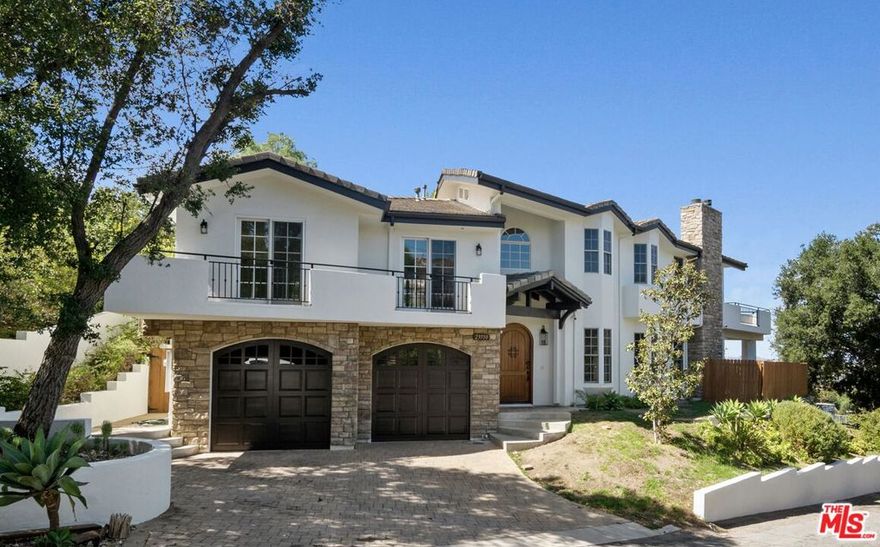 Presenting this beautiful and spacious Calabasas Highlands custom build home with nature views. Nestled in the hills of Calabasas, this 4 bed 5 bath home features a formal entry with vaulted ceilings, wood floors and recessed lighting throughout. The kitchen features granite slab counter-tops and stainless steel appliances. A breakfast bar opens to the family room with a fireplace. Each bedroom has en-suite bathrooms, picturesque windows, and a balcony or patio space. The primary suite is expansive with vaulted ceilings, fireplace, massive walk-in closet, over-sized shower and Jacuzzi tub & large balcony with views. Las Virgenes School District.