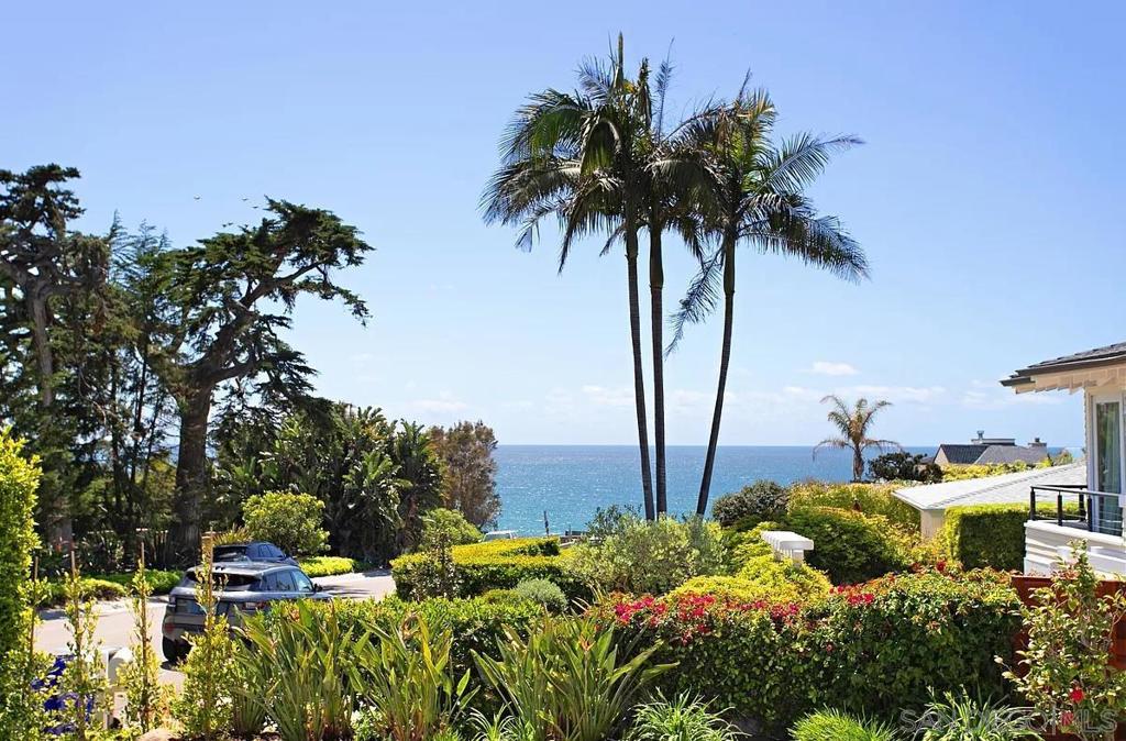 Your casually sophisticated summer retreat starts here with ocean views and a huge backyard. Located on 9th Street west of Camino Del Mar, this 3BR/3BA house is welcoming, updated and airy. French doors open from the kitchen onto the yard while the family room is cozy w/ a fireplace. The primary has an ocean-view balcony; a secondary is furnished w/ bunk beds. Outside: Kick back w/a fire pit, jacuzzi, grilling area & plush outdoor seating. Prime location: Walk to beaches, Del Mar Village and farmers market. Available starting April 18th. Rates adjust depending on season.