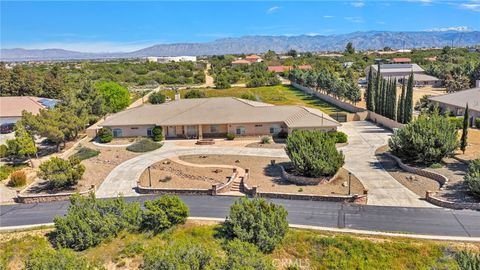 Photo of 7091 Coriander Trl, Oak Hills, CA 92344 (MLS # HD26063570)