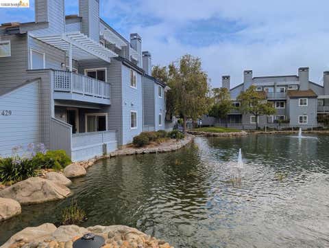Photo of 429 Cork Harbour CIR CIR #APT G, Redwood City, CA 94065 (MLS # 41140012)