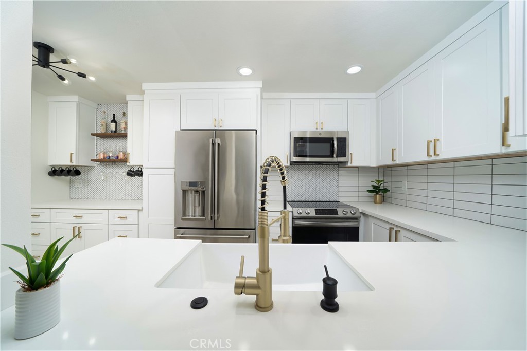 3D tour: https://tinyurl.com/25671LeParc1. Stylish & Model Perfect End Unit. Birds of Paradise greet you on your path around the pool to your front door. This ground-level unit was formerly the model/sales office. . . featuring enclosed front patio with a view of the pool & spa. Enjoy smart Ecobee thermostat, dual pane windows, new AC, durable & waterproof luxury vinyl plank flooring throughout, frosted glass entry doors, bedroom window shutters, and newly repiped throughout! Freshly remodeled with upgraded stainless steel appliances (all included) & quartz counter tops. Large walk-in storage closet in living room doubles as a pantry and coat closet. New in-closet stackable laundry units included, and one car garage with automatic door opener PLUS an extra parking space. Plenty of association amenities including 3 pools/spas, outdoor showers, clubhouse rock waterfalls & greenbelts. Water, sewer, HOA, and trash utilities are paid for by landlord. Walk to Chipotle, Stater Bros, Pengo, thai food, Starbucks, Del Taco, Super Cuts, animal hospital & nail salon. Close to Rimgate Park’s playground, picnic area, grassy areas, & basketball court. Located at the end of the walkway for ultimate privacy. Pets ok! Make this stunning home yours today.